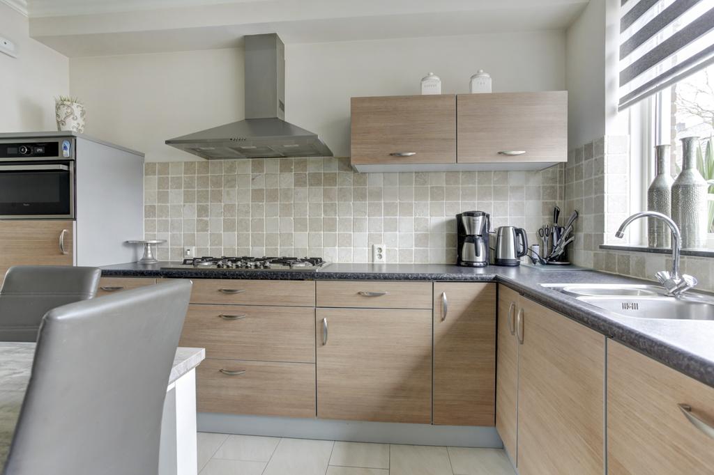 Hoekwoning te koop: Kloosstraat 11, Alblasserdam